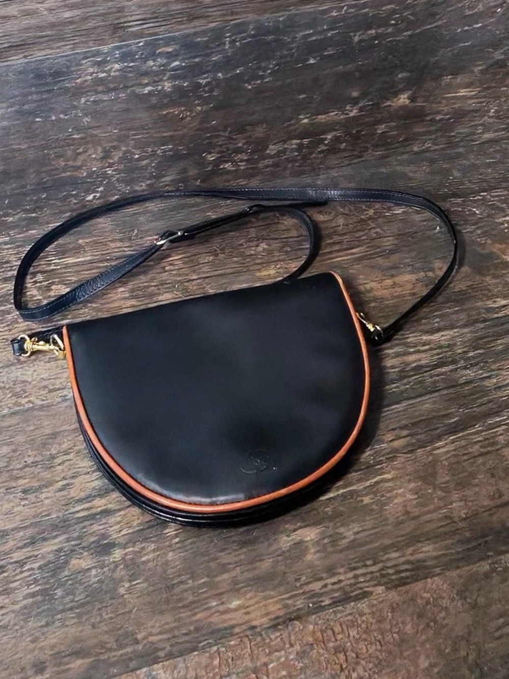 Leather Crescent Crossbody Bag in Black with Brown Trim